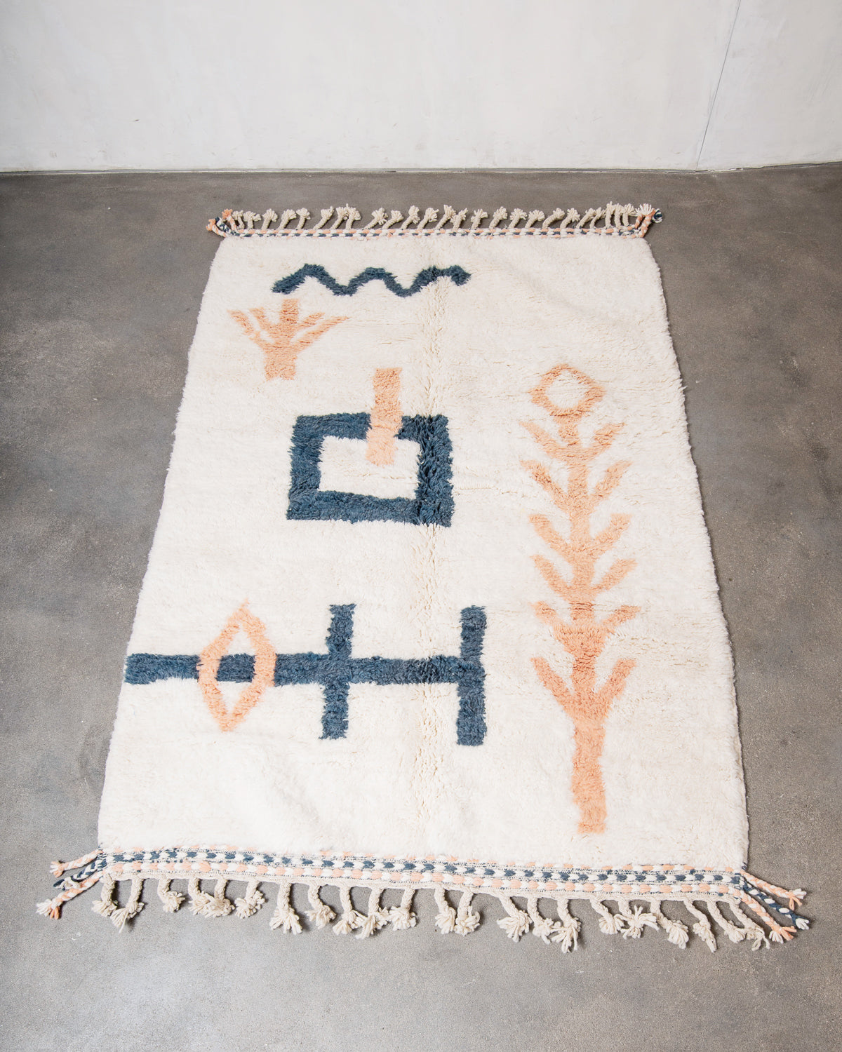 Modern, designer, handcrafted Berber rug from Morocco. Beniourain carpet with beautiful colours and patterns and fluffy wool texture.